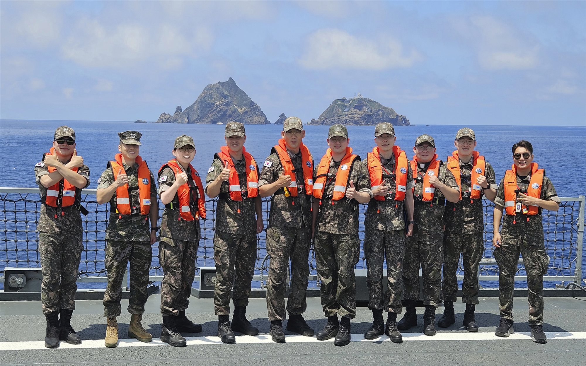 Group photograph on deck during coastal training