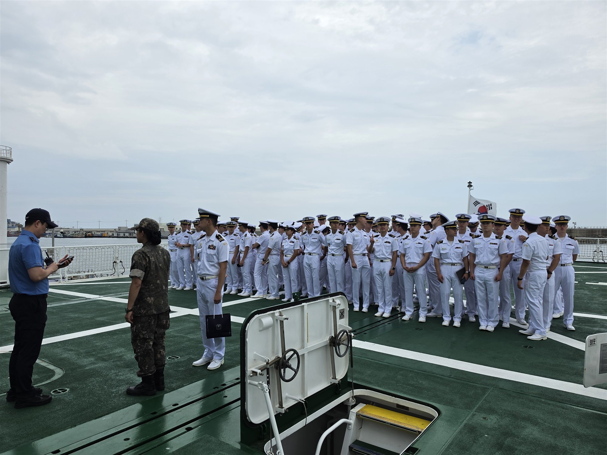 Midshipmen gathered on deck