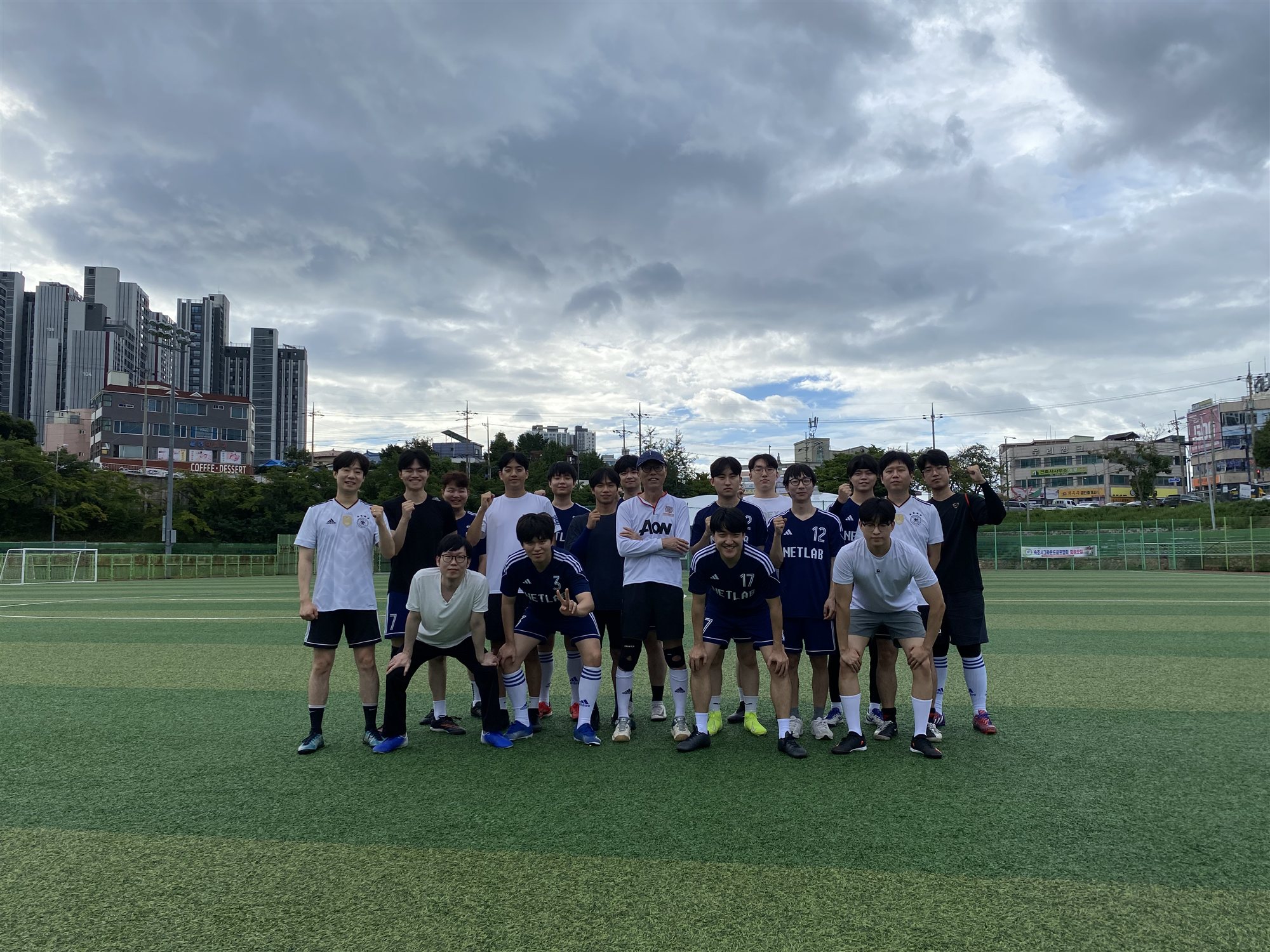 Labmates together on a football field